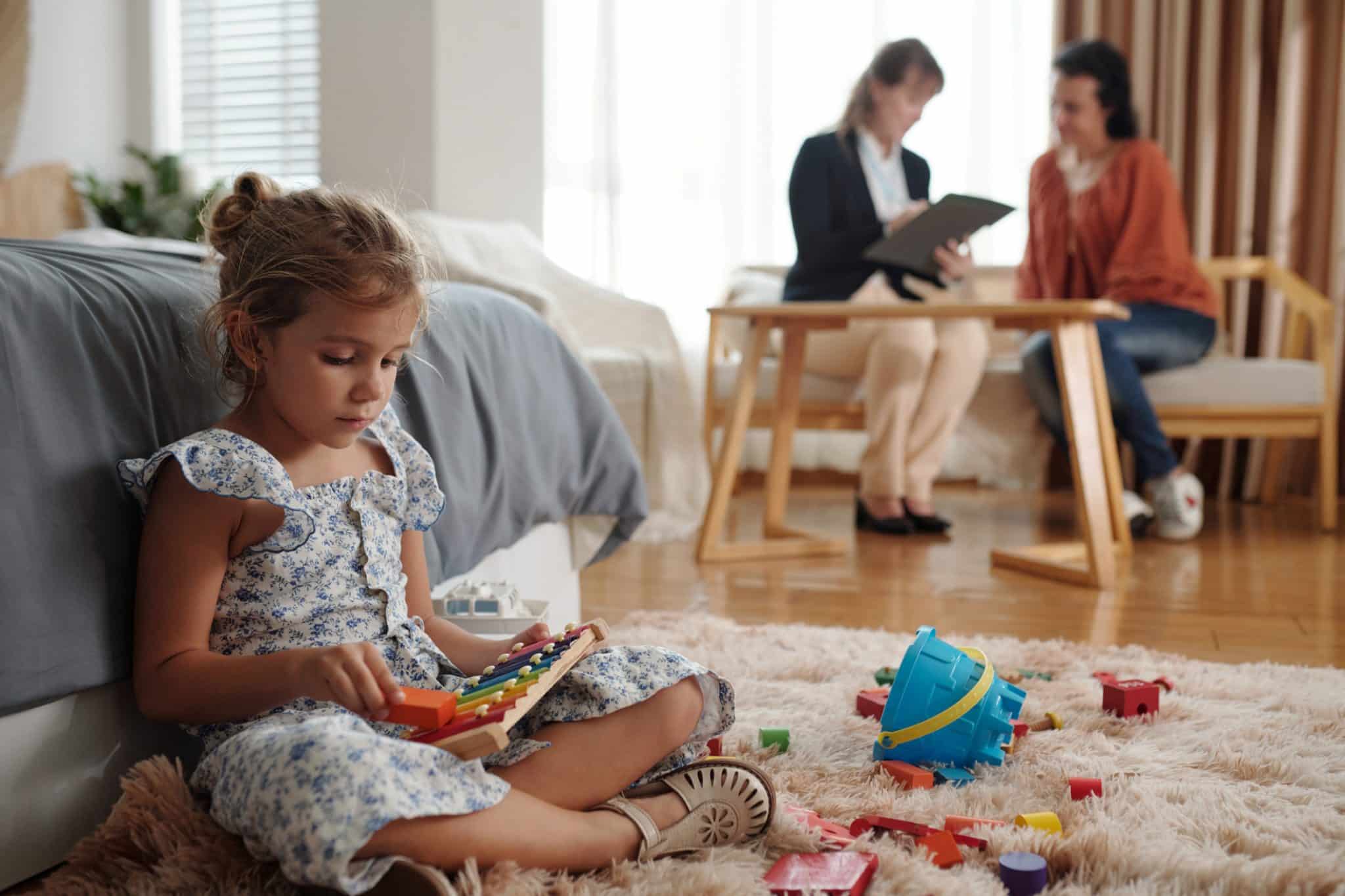 Girl Playing Toys In The Room